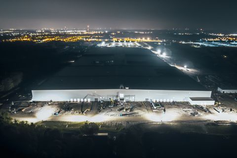 An aerial photo of the former Ultium Cells EV battery factory near Lansing, Michigan. The photo was taken at night.